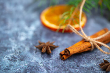 Festive background for the new year 2021. Christmas tree on the table with dried fruits and spices, background for New Year's recipes. Elegant card decor for Christmas greetings.