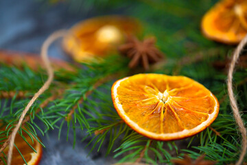 Festive background for the new year 2021. Christmas tree on the table with dried fruits and spices, background for New Year's recipes. Elegant card decor for Christmas greetings.