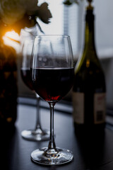 A glass of red wine.