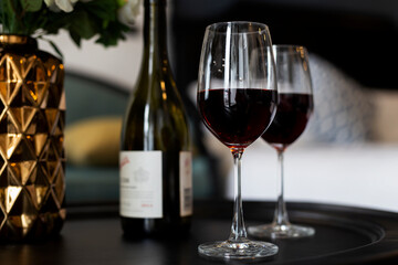 A glass of red wine.