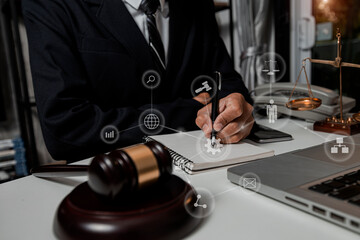 Concepts of Law and Legal services. lawyer business working on digital tablet and law interface icons.	