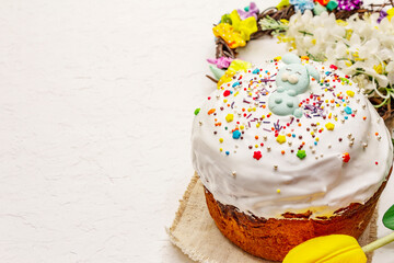 Easter cake on white putty background. Traditional Orthodox festive bread