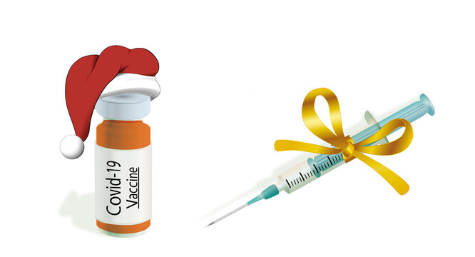 Eine Ampulle mit Aufschrift Covid-19 Vaccine und mit Weihnachtsmütze und eine Spritze mit goldener Schleife.