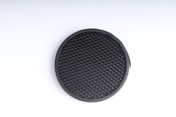 black honeycomb on white isolated background. diffuser products for photographic light