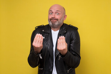 Caucasian man making italian gesture having blaming his friend for mistake. Studio shot