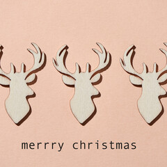 reindeer heads and text merry christmas