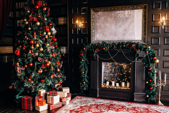 Stylish interior of room with beautiful Christmas fir tree and decorative fireplace