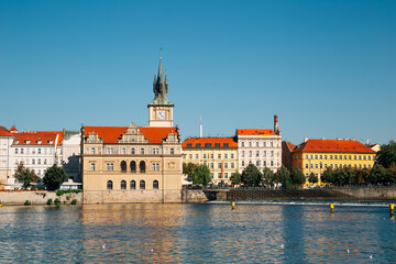 Obraz premium Vltava river and medieval old buildings in Prague, Czech Republic