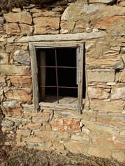 window in stone wall