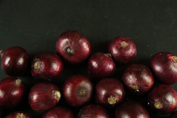 Obraz premium sweet red onions on background