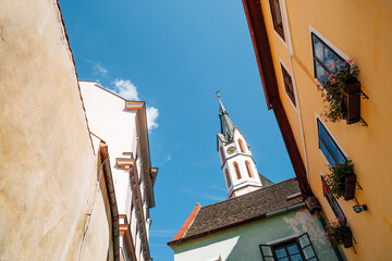 Church of St. Vitus tower and colorful houses in Cesky Krumlov, Czech Republic