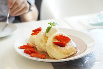 Fluffy pancake with Chocolate nuts sauce.