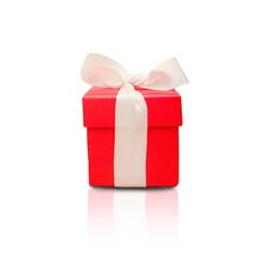 Obraz premium Red gift box with white ribbon isolated on white background. Copyspace