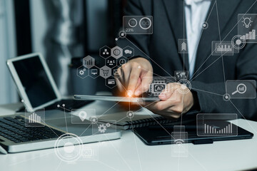 Double exposure of business hands working on digital tablet and smart phone with digital marketing virtual chart, Abstract icon, Business strategy concept.