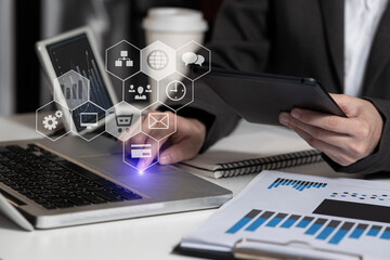 Hands of business people working with documents and digital network and stock exchange market with with graphs analysis candle interface icons on table office. 