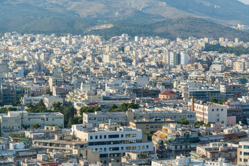 Aerial view of cityscape with crowded buildings of Athens in a sunny day in Greece