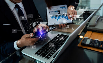 Double exposure Concept. Hands of business people working with documents and laptop and network connection on virtual screen at office table, Digital marketing.