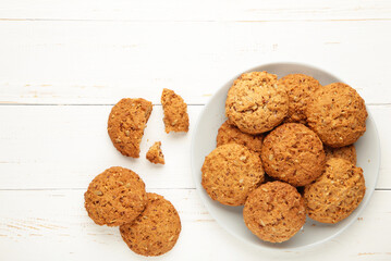 Stack of cookies on the plate on white background