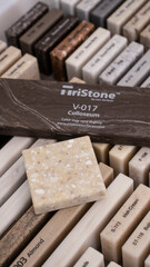 Decorative artificial stone in samples. Suitcase with samples of artificial stone. Finishing material, interior renovation. Gomel / Belarus / 18.12.2020 year