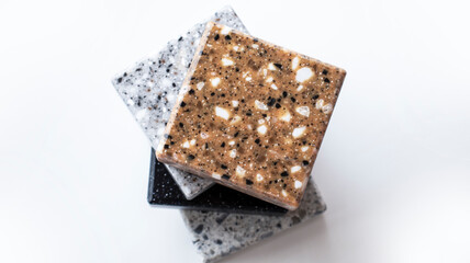Decorative artificial stone in samples. Suitcase with samples of artificial stone. Finishing material, interior renovation.