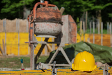 Orange electric cement or concrete mixer