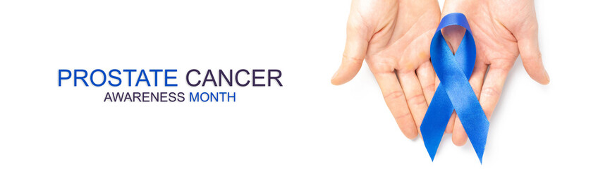 Prostate awareness. Blue ribbon in hands isolated on white background. Awareness prostate cancer of...
