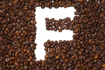 Symbol F, the letter of an aphovite made of coffee. Coffee background, letter F