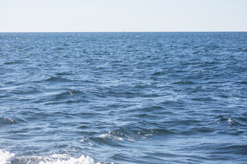 Fototapeta premium Ripples on surface of beautiful ocean water background