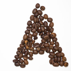 Symbol A, the letter of an aphovite made of coffee. Coffee background, letter A