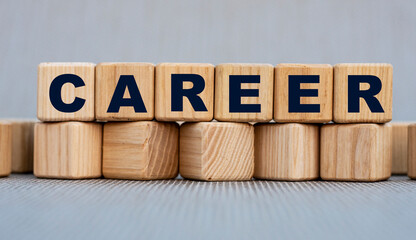 CAREER - word on wooden cubes on a beautiful gray background