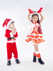 Merry Christmas girl Wearing Santa claus suit Dancing baby shark on white background
