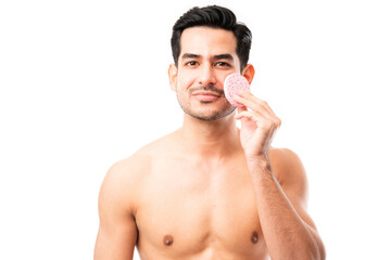 Fototapeta premium Latin man grooming in studio