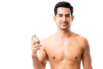 Fototapeta premium Good looking man wearing cologne