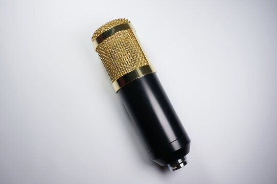 Gold condensor Mic isolated on white background.       