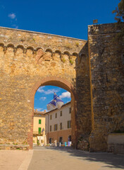 Naklejka premium Porta Nuova, one of the gates to the historic medieval village of San Quirico D'Orcia, Siena Province, Tuscany, Italy