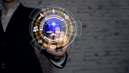 Concepts of Law and Legal services.	lawyer working with digital technology interface icons.