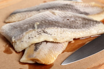 Pickled herring. Salted, soused skinless fillets of fish Clupea.