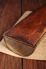 Freshly baked raisin butter cake in loaf tin