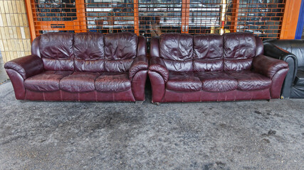 Two Leather Sofas in Front of Shop