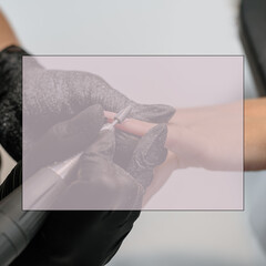 Manicurist using electric file drill to clean female nails in beauty salon, with field for ad text