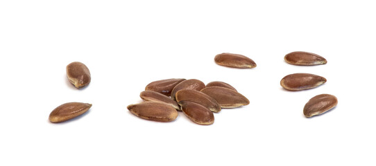 Small group of linseeds or flax seed seen obliquely from above and isolated on white background
