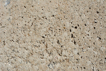 Textured stone, sandstone, limestone surface. Close image. Stone, natural abstract texture for backgrounds. Close up.  architecture.