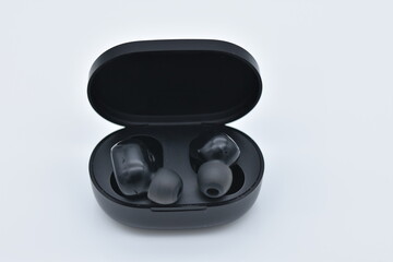 A pair of rechargeable ear-plug headphone