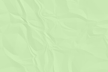 crumpled green paper background close up