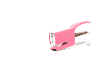 Pink stapler isolated on white background.