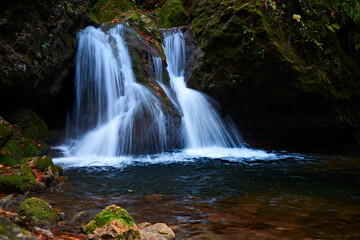 Fototapeta na wymiar Waterfall on a mountain river.