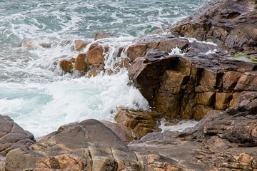 waves crashing on rocks