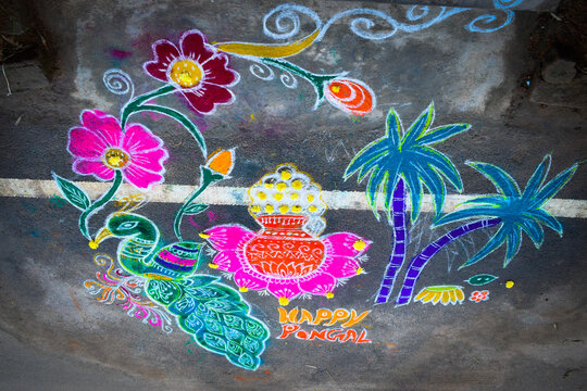 beautiful colorful Rangoli muggulu designs with colours in India during pongal sankranthi festival and in all hindu festivals in fronts of their houses and temples
