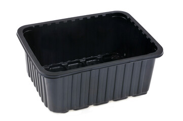 Barquette en plastique noir vide en gros plan sur fond blanc