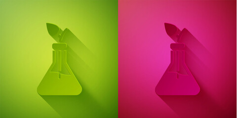 Paper cut Plant breeding icon isolated on green and pink background. Plants growing in the test tubes. Organic food ,agriculture and hydroponic. Paper art style. Vector.